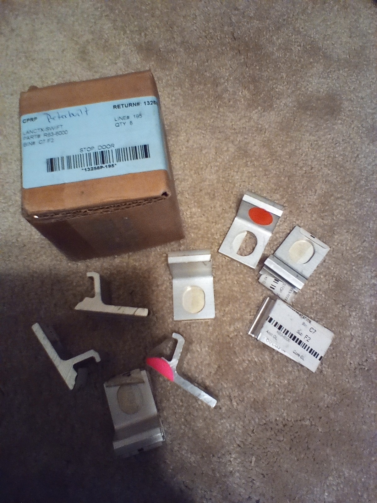 NOS OEM Peterbilt part R83-6000 Stop Door qty. 8 as is
