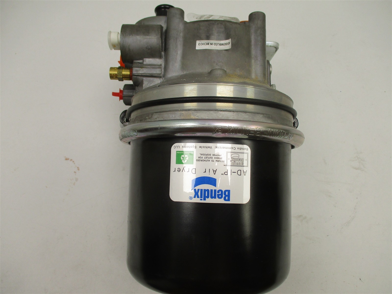 6126228C91 NEW OEM INTERNATIONAL 12V AD-IP AIR DRYER W/ BRACKETS GENUINE BENDIX