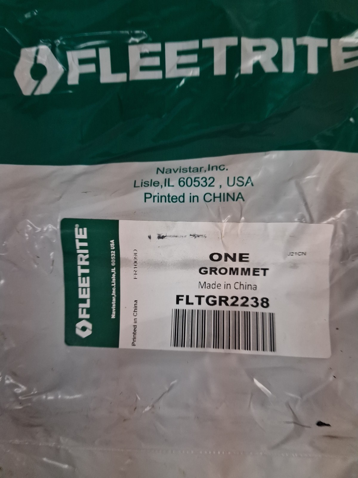 NAVISTAR PDC GROMMET OPN BACK 2 INX6 IN LMP FLTGR2238