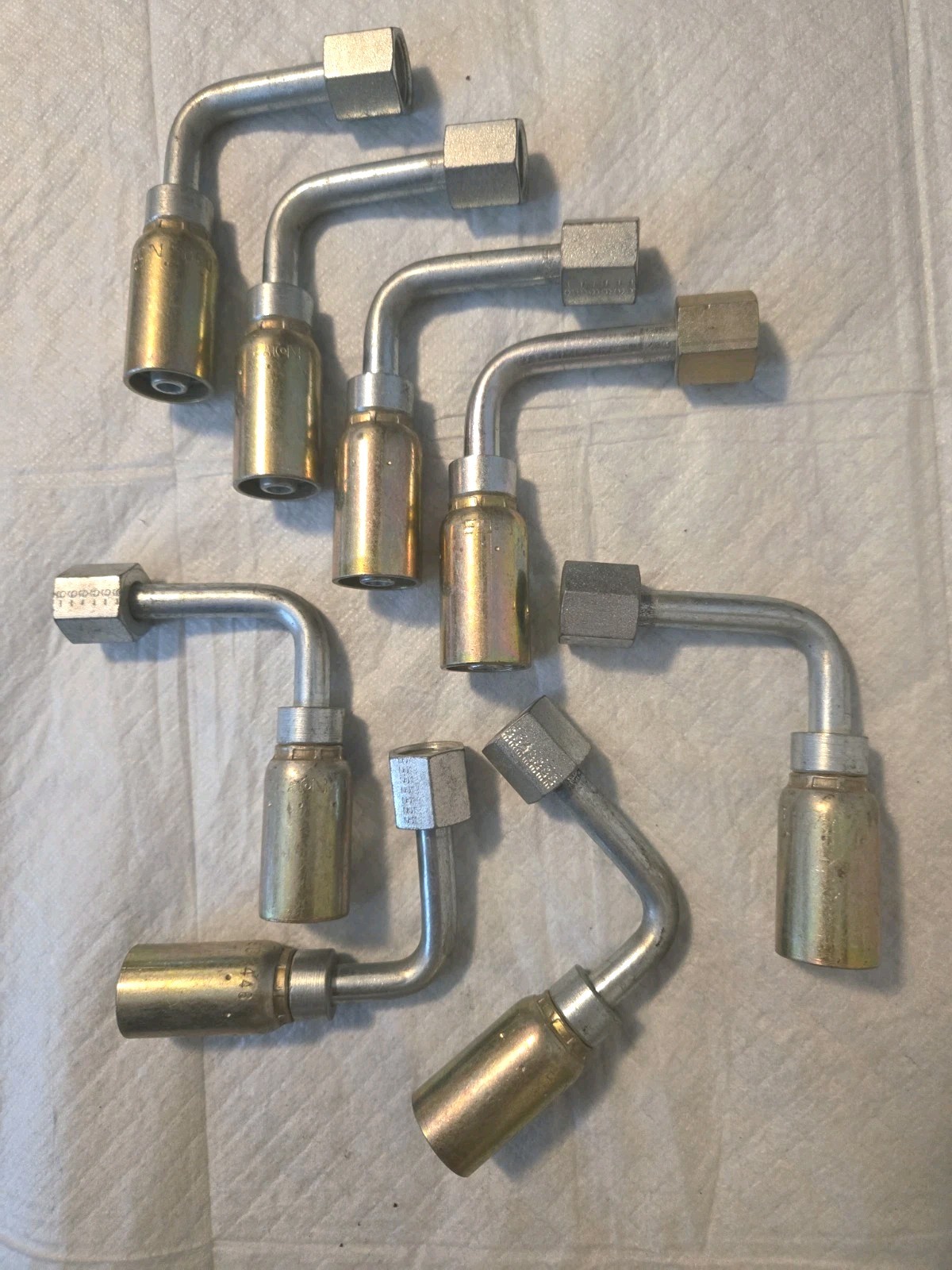 (8) **Eaton 06U-446 Fitting 3/8” Hose x 3/8” Female SAE 45 Swivel 90 Long Drop