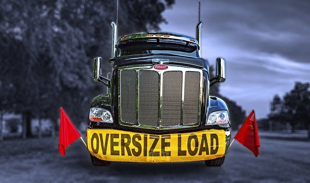 18″ x 84 Oversize Load Sign w/ 6 Grommets – Heavy Duty Vinyl Mesh – Made in USA