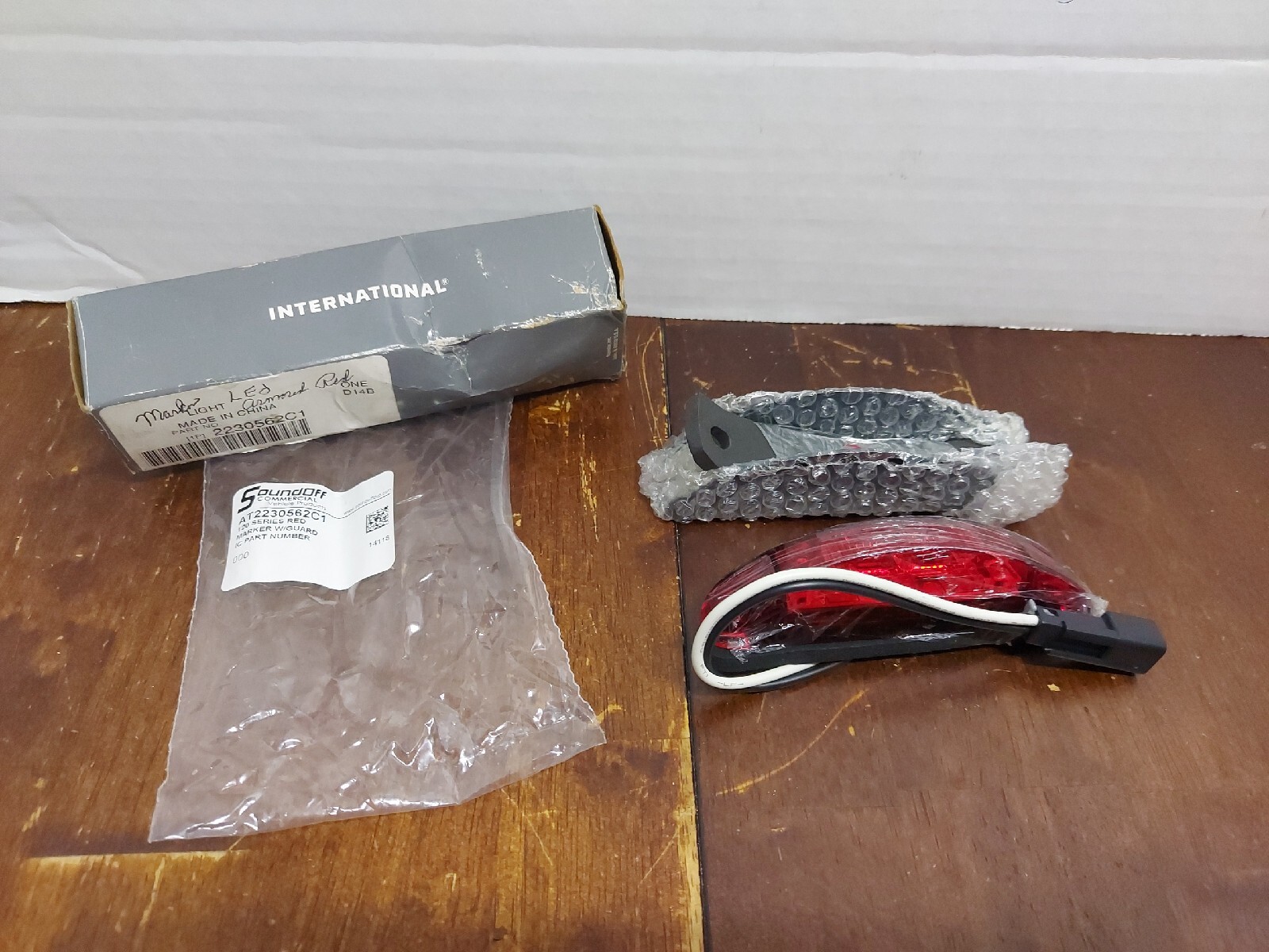 NOS International 2230562c1 LIGHT MARKER, LED, ARMORED, RED. (SOUND OFF)