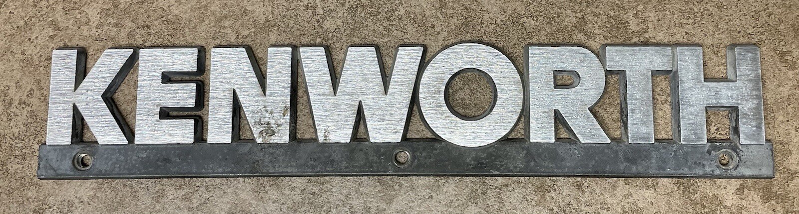 GENUINE “KENWORTH” NAMEPLATE BLACK & SILVER K281-1348 # 13637