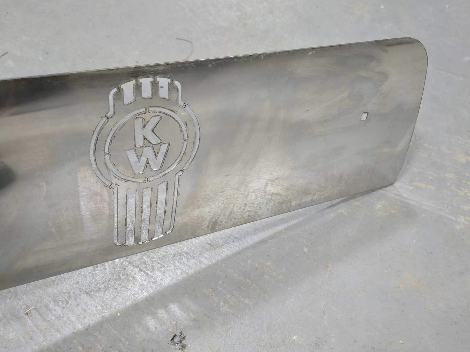 Kenworth MD1569 W900 W900L Stainless Steel Fender Guard Below Headlight KW Logo